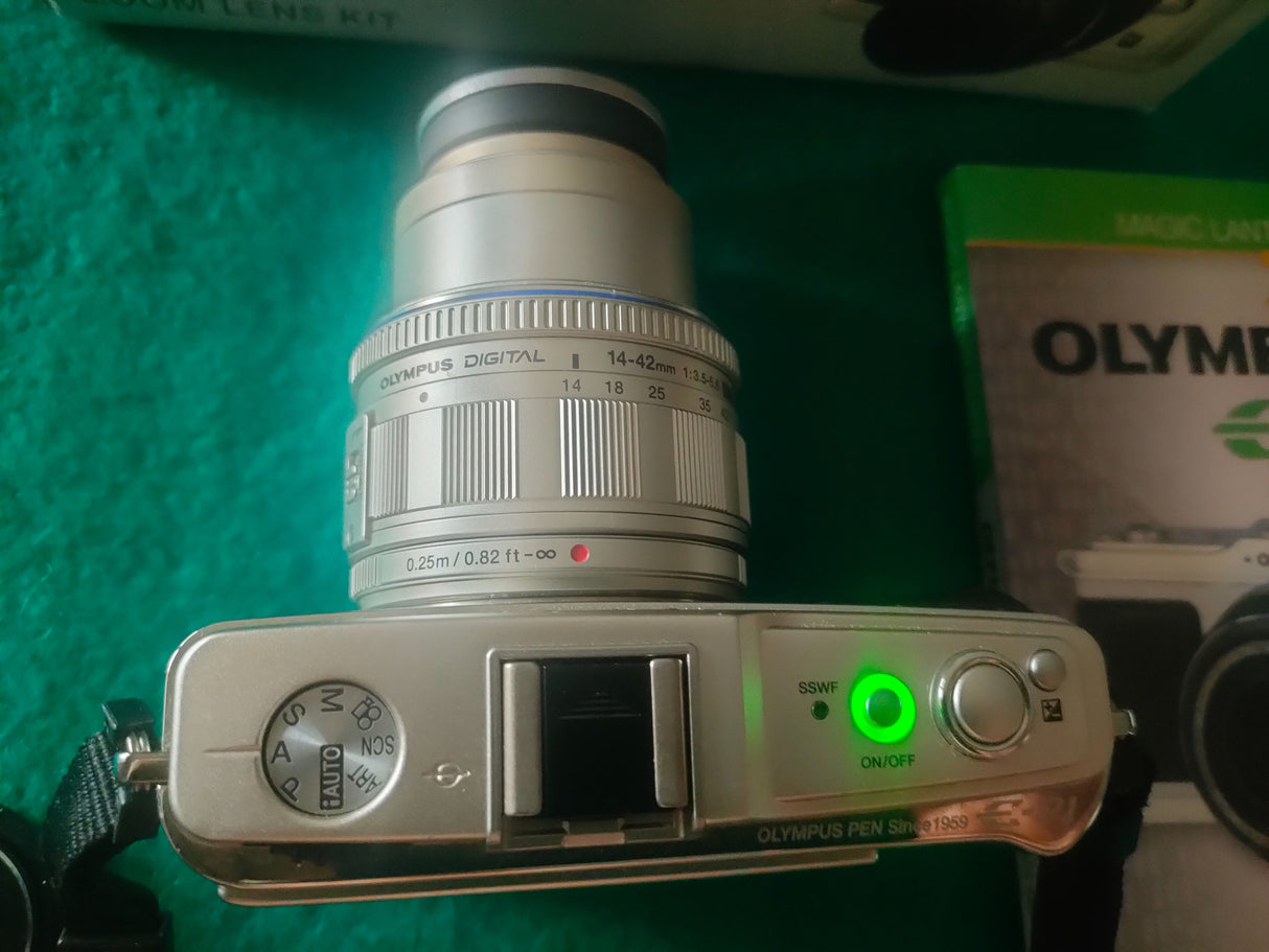 Olympus Pen EP-12fd306b8-336a-4918-bf00-55052cbefef3