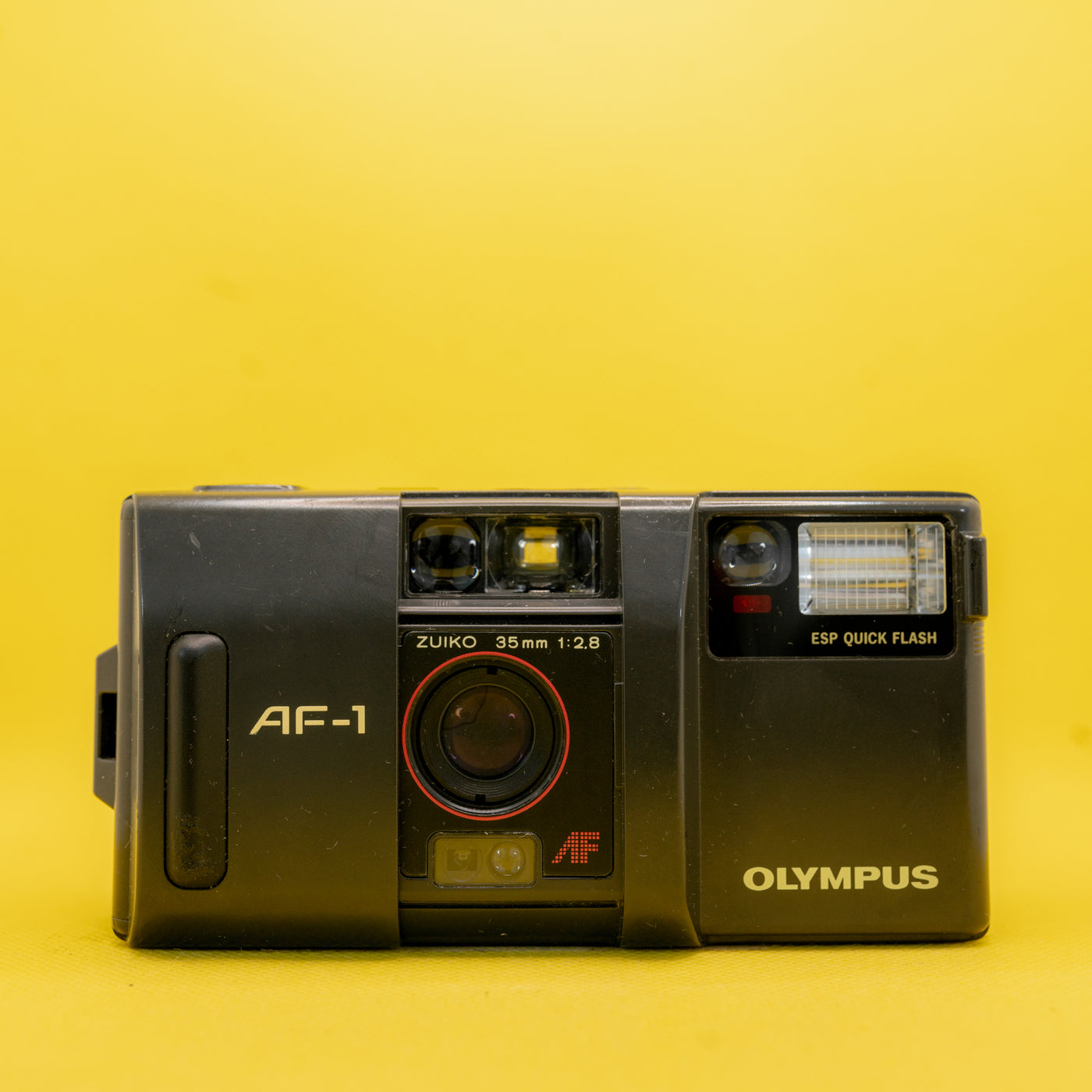 Olympus AF-1 - Câmera de Filme Premium 35mm (Zuiko 2.8) · imagem principal